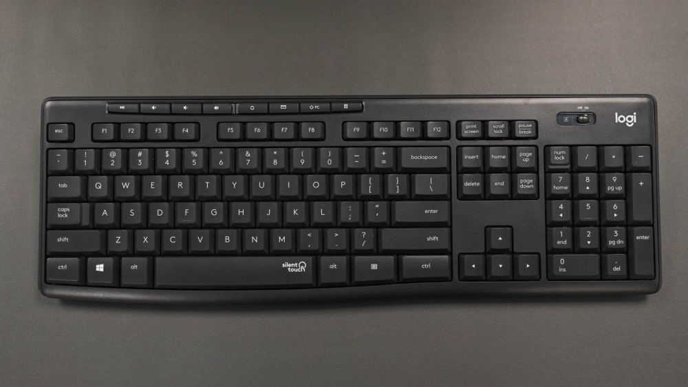 A standard Logi keyboard on a desk 